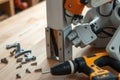 Robot repairing broken workbench leg Royalty Free Stock Photo