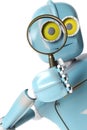 Robot retro looking through a magnifying glass. vintage cyborg Royalty Free Stock Photo