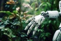 The robot\'s arm takes care of the plants. Innovative technologies of the future