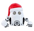 Robot Santa pointing in blank advertisement banner. Isolated. Cliping path