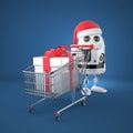 Robot Santa with shopping cart Royalty Free Stock Photo