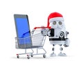 Robot Santa with tablet computer and shopping cart Royalty Free Stock Photo