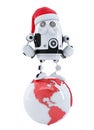 Robot santa on top of the globe. Technology concept.