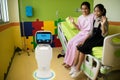 Robot service in medical talk with the patient at patient room i