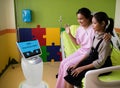 Robot service in medical talk with the patient at patient room i