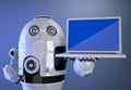 Robot shownig blank screen laptop Royalty Free Stock Photo