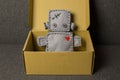 Robot Soft Toy with Heart in Box. Royalty Free Stock Photo