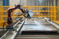 robot spraying anticorrosion coating on metal sheets Royalty Free Stock Photo