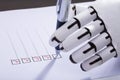 Robot Ticking Off Checkboxes On Document