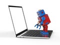 Robot tin toy with notebook Royalty Free Stock Photo