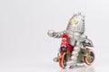 A robot toy is riding bicycle Royalty Free Stock Photo