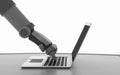 Robot using a computer isolated on white. Hand of artificial Royalty Free Stock Photo