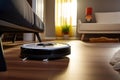 robot vacuum cleaner in modern smart home on wooden floor? Modern smart cleaning technology housekeeping.