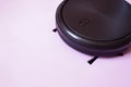 Robot vacuum cleaner performs automatic cleaning. Indoor, housework