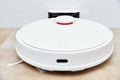 Robot vacuum cleaner return to charge after cleaning room Modern smart household Royalty Free Stock Photo