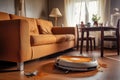 robot vacuum cleaning under a sofa, revealing hidden dust