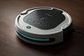 robot vacuum stops for moment to recharge, with charging indicator light visible