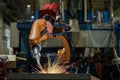 Robot is welding part in automotive factory