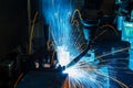 Welding robots movement in a car factory Royalty Free Stock Photo