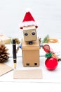 Robot will write congratulations on the card with Christmas and