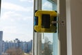 Robot window cleaner work on dirty window. Cleaning the house with smart devices. Automatic vacuum robots for cleaning Royalty Free Stock Photo