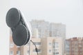 Robot window cleaner work outside the dirty window. Cleaning the house with smart devices. Automatic vacuum robots for Royalty Free Stock Photo