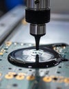 Robotic Arm Applying Epoxy to a Circuit Board Royalty Free Stock Photo