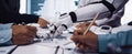 Robotic Arm Assists in Data Analysis and Business Strategy Development During Corporate Meeting with Diverse Team Royalty Free Stock Photo