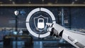 Robotic Arm Interacting with Digital Security Icon on Futuristic Interface in Modern Office Setting with City Skyline Royalty Free Stock Photo