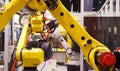 Robotic arm manipulators on conveyor Tracking controller Royalty Free Stock Photo