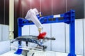 Robotic arm painting spray to the automotive part. High-technolo