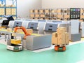Robotic arm picking parcel from conveyor to AGV Royalty Free Stock Photo