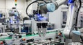 Robotic arm manipulator working on electronic circuit board assembly in modern automated factory plant Royalty Free Stock Photo