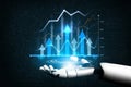 Futuristic Robotic Arm Displaying Data Visualization with Upward Trends and Graphical Indicators for Business Growth Royalty Free Stock Photo