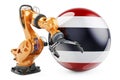 Robotic arm with Thai flag. Modern technology, industry and production in Thailand concept, 3D rendering