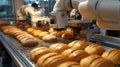 Robotic Arms Efficiently Process Bakery Goods On Conveyor Belt Royalty Free Stock Photo