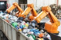 Robotic Arms in High-Tech Recycling Facility for Waste Management