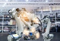 Robotic arms, industrial robots factory automation machines Royalty Free Stock Photo