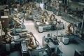 robotic assembly line, with a stream of parts moving past and being assembled into finished products