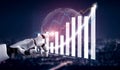 Robotic Hand Analyzing Financial Growth Data with Digital Charts and Global Background in Futuristic Setting Impute Royalty Free Stock Photo