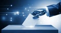Robotic hand casting vote into ballot box for electronic election and digital democracy concept Royalty Free Stock Photo