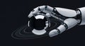 Robotic Hand Holding Spherical Chrome Object with Circular Patterns on Dark Background Technological Precision Concept Royalty Free Stock Photo