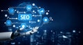 Futuristic Robotic Hand Presenting SEO Concepts and Digital Strategy with Icons Representing Data Mining and Keyword Royalty Free Stock Photo