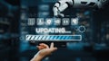 Robotic Hand Interacting with Digital User Interface, Progress Bar Displaying Updating Status in Futuristic Technology Royalty Free Stock Photo