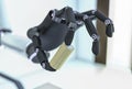 A robotic hand with a euro coin