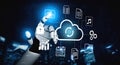 Robotic Hand Interacting with Digital Cloud Storage Icons Representing Data Management, Security, and Technology in Royalty Free Stock Photo