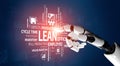 Robotic hand interacting with digital concepts of lean management, efficiency, and production, representing modern Royalty Free Stock Photo