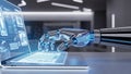 Robotic hand interacting with a futuristic laptop displaying glowing data and charts Royalty Free Stock Photo