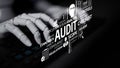 Futuristic robotic hand typing on a keyboard with audit terminology, highlighting analysis, compliance, standards, and Royalty Free Stock Photo