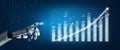Robotic Hand Pointing at Data Chart with Rising Graph and Digital Elements in Blue Background Impute Royalty Free Stock Photo